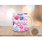 Close-up of personalized 3D heart coffee mug with a romantic message.